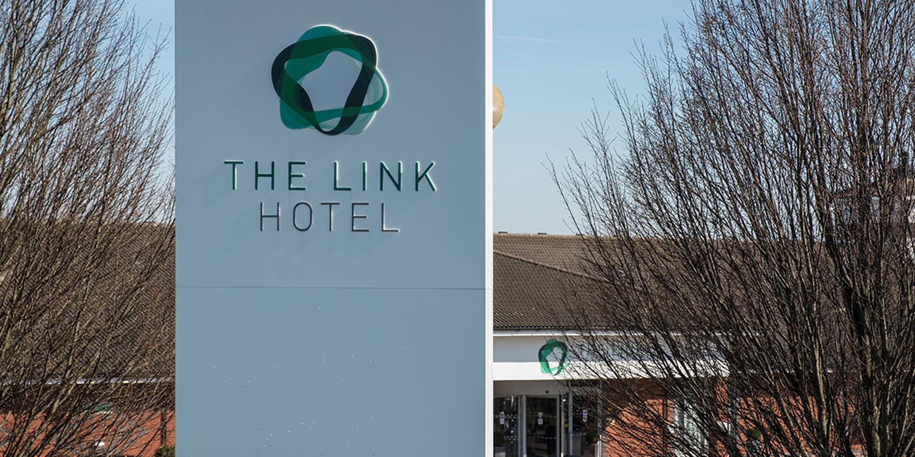 The Link Hotel Welcome Sign